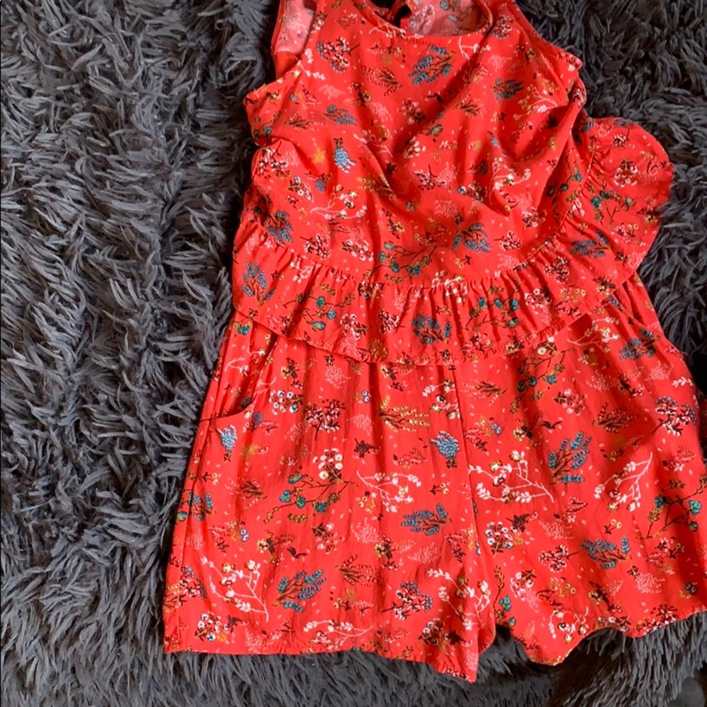 Red art class romper with flowers